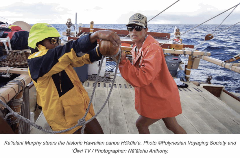 Ka’iulani Murphy steers the historic Hawaiian canoe Hōkūle’a. Photo ©Polynesian Voyaging Society and ‘Ōiwi TV / Photographer: Nā’ālehu Anthony.